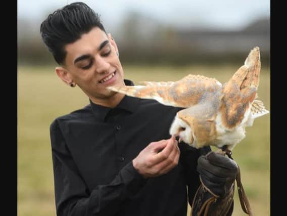 Bailey Lister with one of the rescue owls