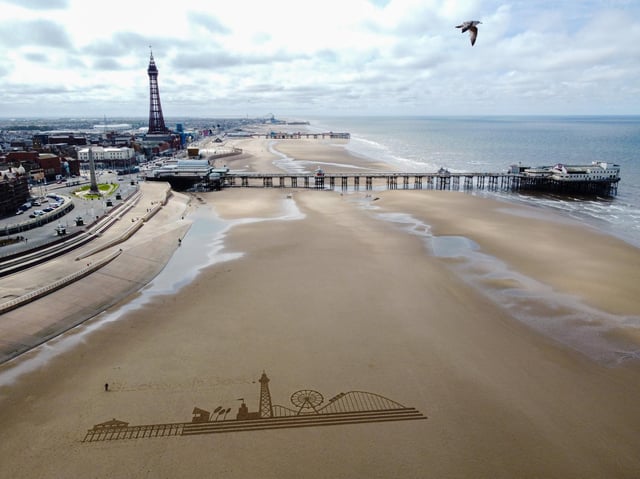 To mark the big day, a 70m etching of the town’s skyline – including the Tower, Central Pier’s big wheel, and the Big One – was raked into the sand on the beach