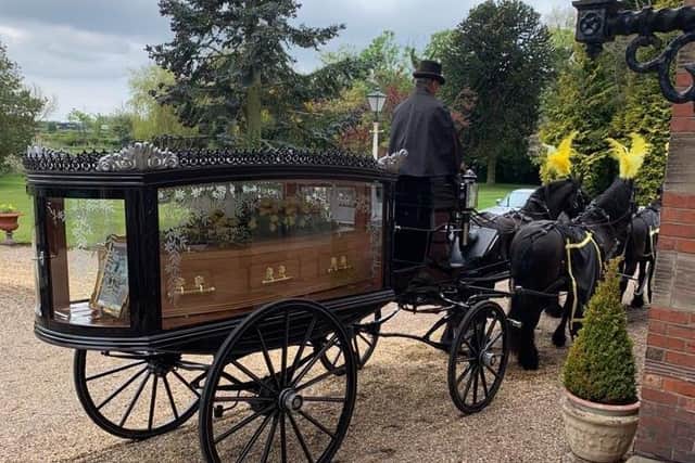 A horse-drawn carriage took Len on his final journey
