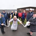 Grand reopening of refurbished toilets on Laidleys Walk in Fleetwood. Kalvin Townsend and Jack Anderton from Shakespeare Primary hold the toilet paper for Coun Mary Stirzaker to cut.