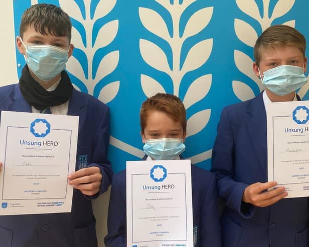 Highfield pupils Levi Burke, Josh Baggaley and Mackenzie Thomas, all aged 13, used their first aid skills to help a man in need and have been recognised with 'Unsung Hero' awards.