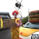 Animal Rebellion protester dressed as a clown