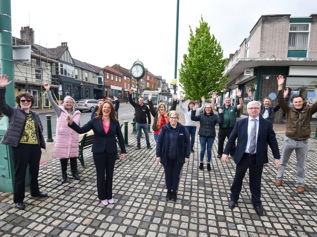 Kirkham traders, civic officials and Fylde MP Mark Menzies celebrate confirmation of the cash award.