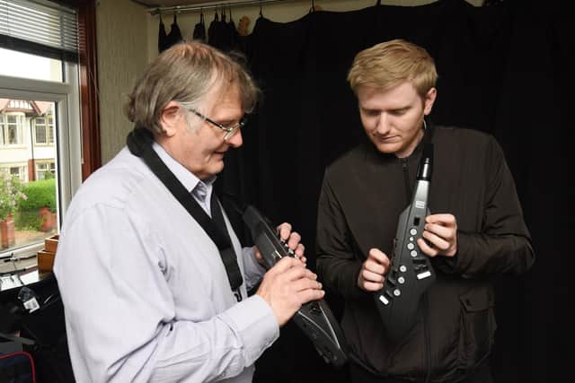 BMS saxophone tutor Ray Jones and reporter James Graves