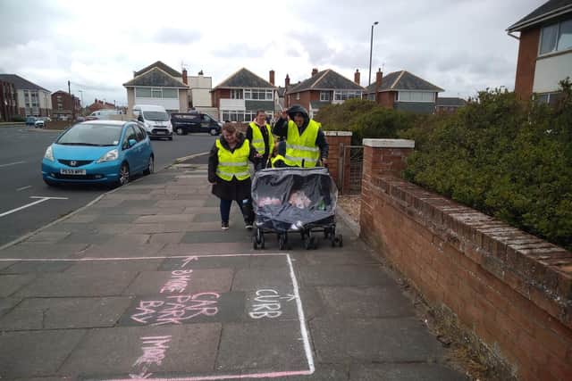 An image showing how nursery school staff would struggle to get down the road if the pavement was narrowed to allow parking