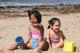 It's sunny weather in Blackpool for Gail, 5 and Gemma, 3