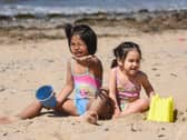 It's sunny weather in Blackpool for Gail, 5 and Gemma, 3