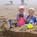 This little duo brought their bucket and spade to the beach