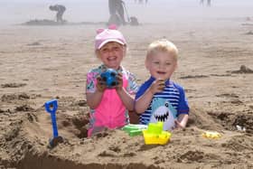 This little duo brought their bucket and spade to the beach
