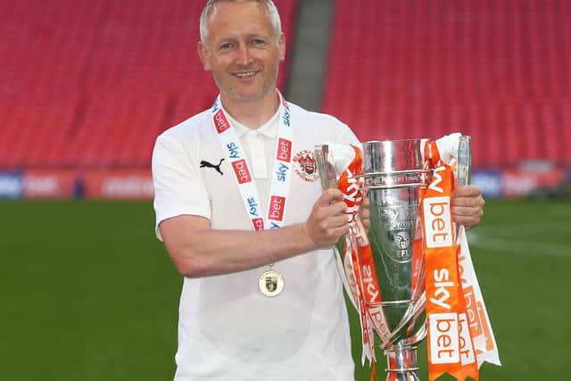 Blackpool boss Neil Critchley with the League One play-off final trophy