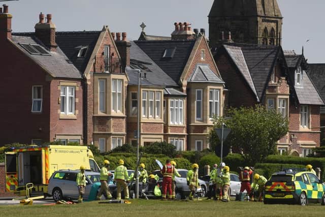Paramedics, fire crews and police work at the scene in East Beach, Lytham
