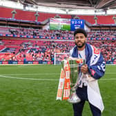 Simms with the League One play-off final trophy
