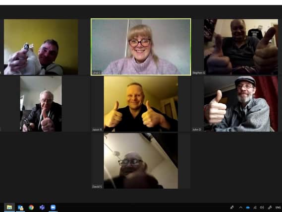 Members of the group taking part in a zoom call