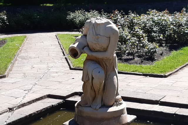 The damaged statue in Ashton Gardens