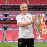Neil Critchley's first full season in charge ended with a Wembley win