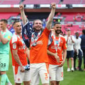 Blackpool's players celebrate their Wembley success