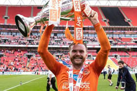 Ollie Turton has decided to leave despite helping Blackpool win promotion