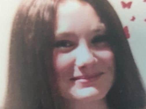 Katie Aitchison, 15, is described as a white, 5'4", slim build, with long black curly hair. She was last seen wearing white and grey gym leggings, a black tube top, a dark blue scarf and beige trainers