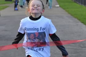 Jordan Banks completes his marathon in Stanley Park