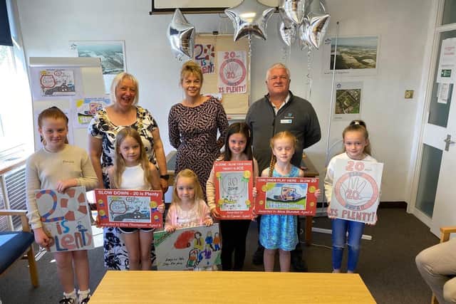 Hawley Gardens colouring competition winners with Mayor of Wyre Andrea Kay, Karen Archer from NPL Group, and deputy mayor Howard Ballard. Picture: NPL Group