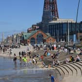 Visitors galore enjoying the sea and sands in central Blackpool.