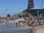 Visitors galore enjoying the sea and sands in central Blackpool.