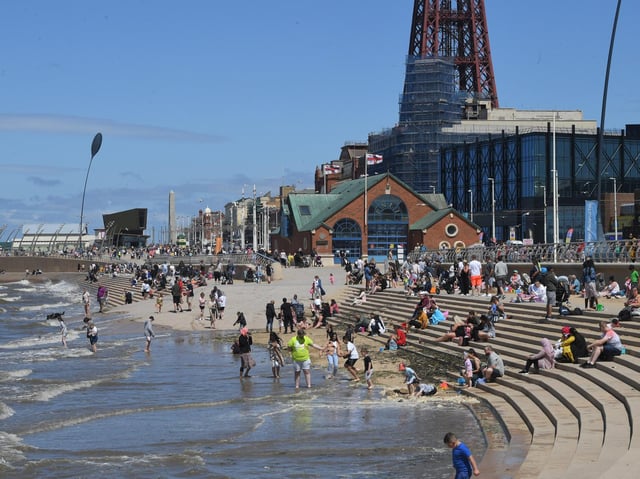 Visitors galore enjoying the sea and sands in central Blackpool.