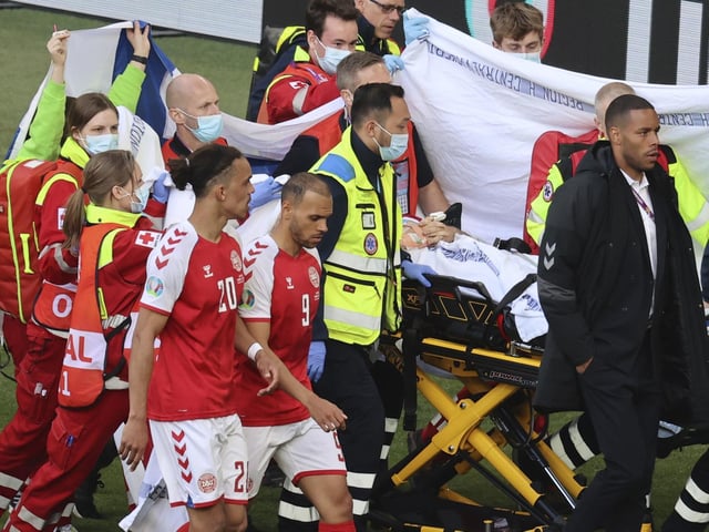 Christian Eriksen collapses on pitch as Denmark play ...