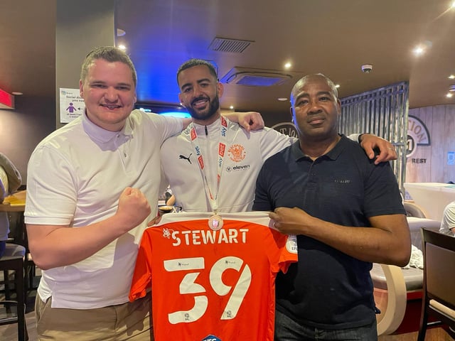 Kevin Stewart (centre) celebrates Blackpool's Wembley triumph with his father (right) and entrepreneur Samuel Leeds