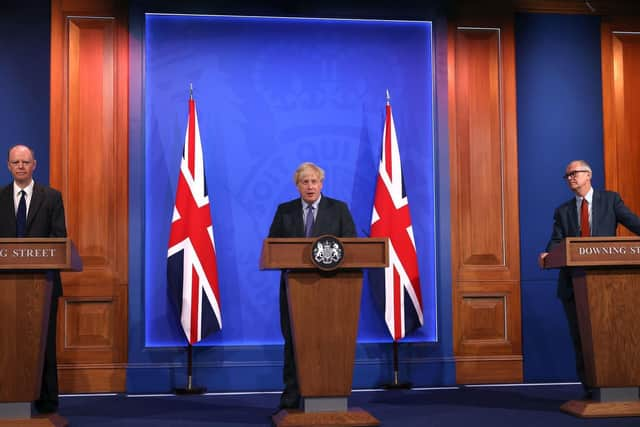 Chief Medical Officer Professor Chris Whitty, Prime Minister Boris Johnson and Chief scientific adviser Sir Patrick Vallance, during a media briefing in Downing Street, London, on coronavirus on July 14. Pic: PA