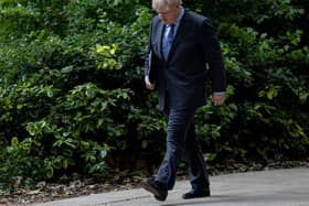 Boris Johnson returns to 10 Downing Street after giving a press conference on June 14