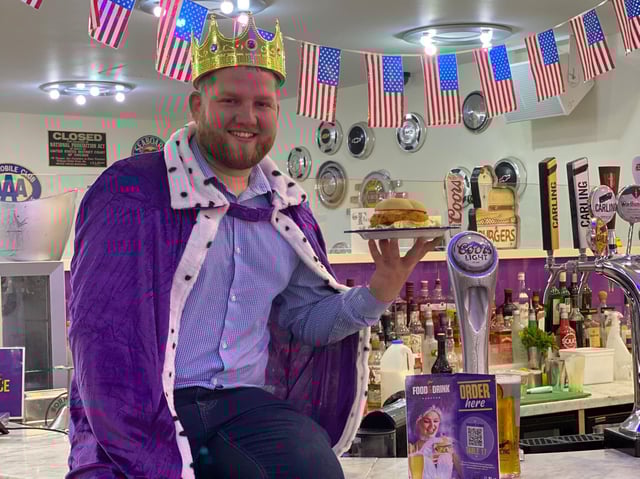 Manager Kieran Dixon, who is dad to daughters Masie, eight, and Eve, posing as a king at Viva Vegas Diner in Blackpool