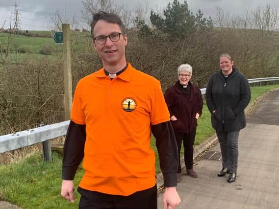 Bishop Philip preparing to set out on his marathon walk, with Rev. Linda Tomkinson from Mereside Church and Rev. Fiona Jenkins of St Bartholomew’s in Chipping
