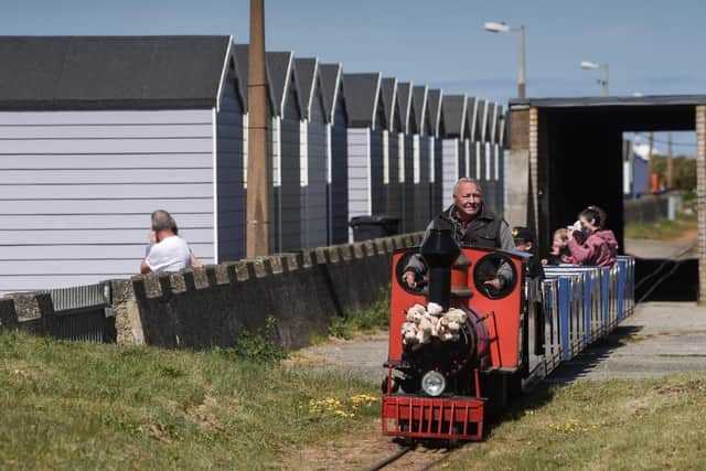 The miniature train and beach huts at St Annes