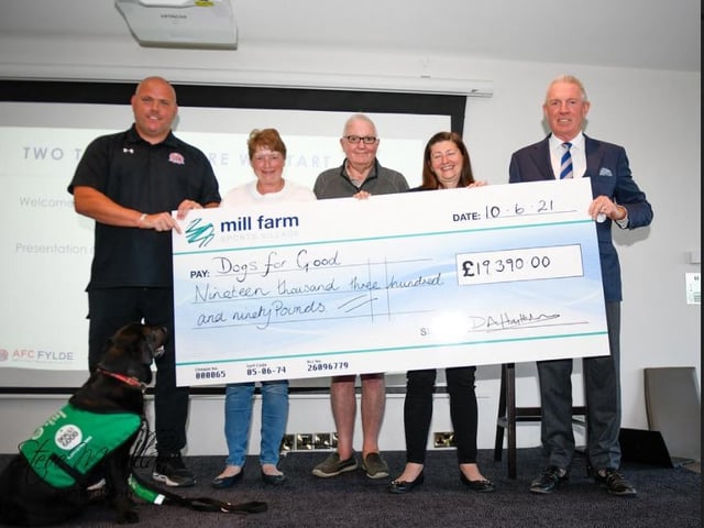 AFC Fylde Chairman David Haythornthwaite and First Team Manager Jim Bentley presented a cheque for £19, 390 to Dogs for Good representatives Charlotte Fryer, her husband Steve and Vicky Blackmore, to help support the work that they do.