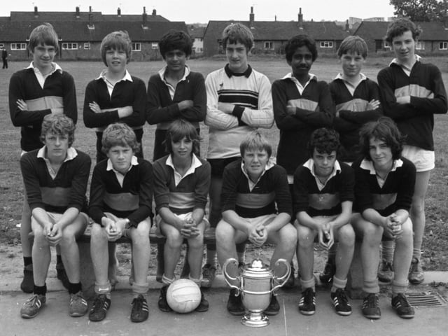 Ashton High School's football team won the Dawson Cup. Front, from left: Neil Houlding, Andrew Ridley, Brian Tennant, Gary Parkinson, Jimmy Bradley, Scott Taylor. Back: Brian Clark, Mick Slater, Paresh Patel, John Sheliker, Arum Patel, Phil Gardner, Stephen Reynolds