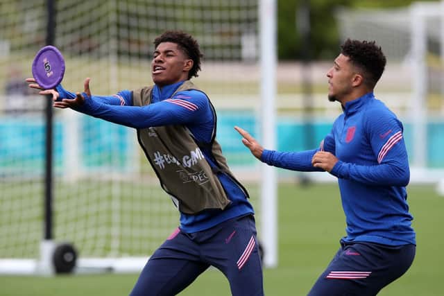Big-match fever is catching: Marcus Rashford (left) and Jadon Sancho in England training at St George's Park on Thursday