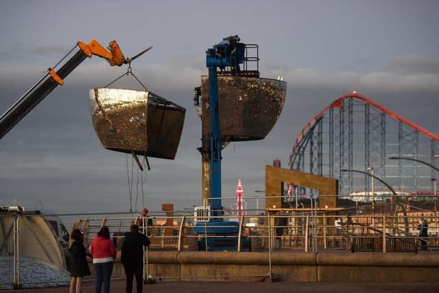 The Mirror Ball is removed for repair last November