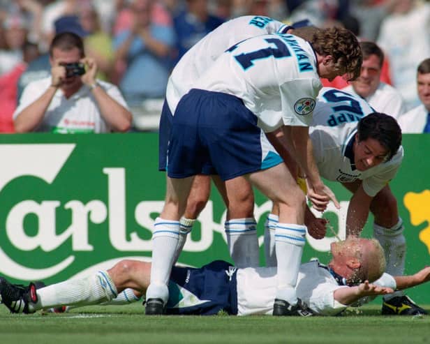 England goalscorer Paul Gascoigne celebrates in the 'Dentists Chair' with Steve McManaman, Alan Shearer and Jamie Redknapp during the 1996 European Championships group stage win over Scotland at Wembley