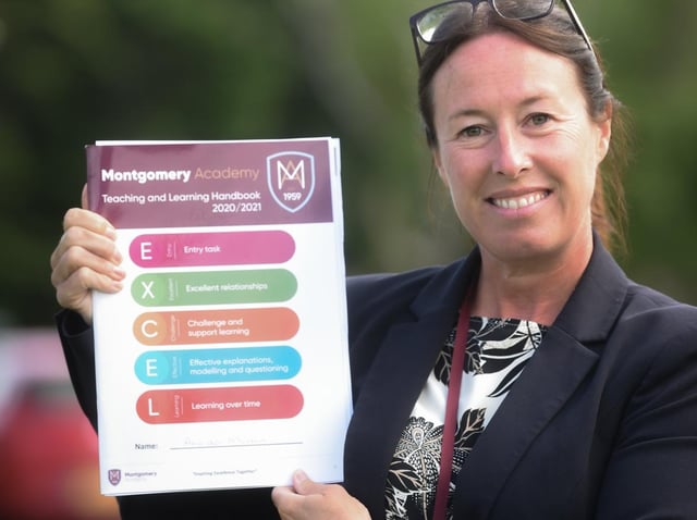 Montgomery Academy's deputy headteacher Amanda Morton, with the international teaching and learning booklet produced by teachers. Photo: Daniel Martino/JPI Media