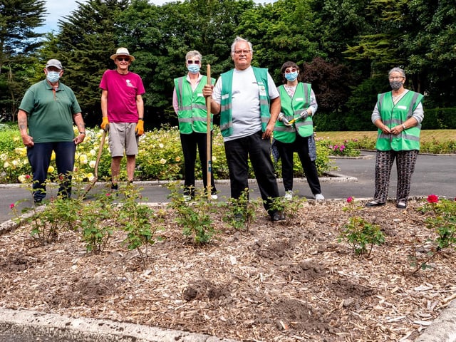 Alan Wignall, Rose Garden volunteers team leader, with (from left) Terry Harrison, Terry Wallis, Diane Glister, Sue Osborne and Pam Harrison, at one of the beds stripped of roses.