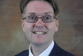 Anchorsholme councillor Paul Galley accused a contractor working on Lidl car park of "reversing into" him with a tarmacking vehicle, and demanded an apology for residents from the retailer.