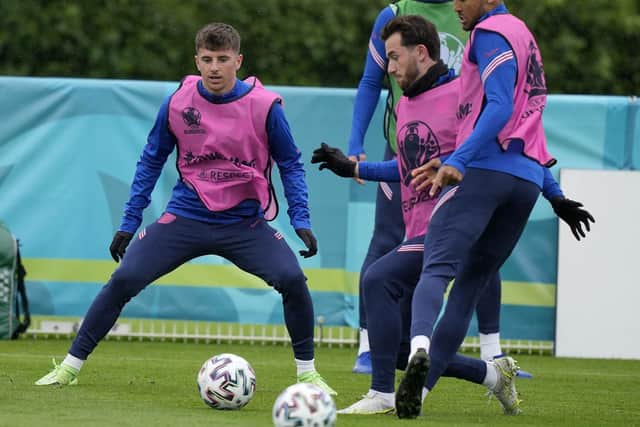 The availability of Mason Mount and Ben Chilwell, here in England training with Dominic Calvert-Lewin (right), for tonight's group decider against the Czech Republic was unclear last night after they 'interacted' with Scotland's Covid-positive Billy Gilmour
