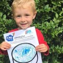 One of Blue Skies' fundraisers George Lonsdale, four, with his birthday cake design ahead of the NHS' 73rd birthday celebrations.