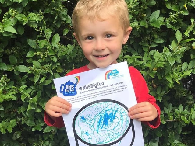 One of Blue Skies' fundraisers George Lonsdale, four, with his birthday cake design ahead of the NHS' 73rd birthday celebrations.