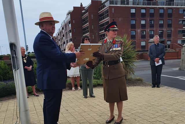 Coun Ed Nash receiving the Lord Lieutenant's Certificate of Merit