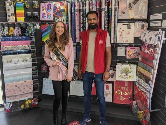 UK winner of Miss Elegance Of The World, Grace Smithen, visited Bispham post office. Pictured with postmaster Qasim Sharif.