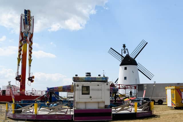 Cubbins funfair being set up in the shadow of the Windmill on Lytham Green
