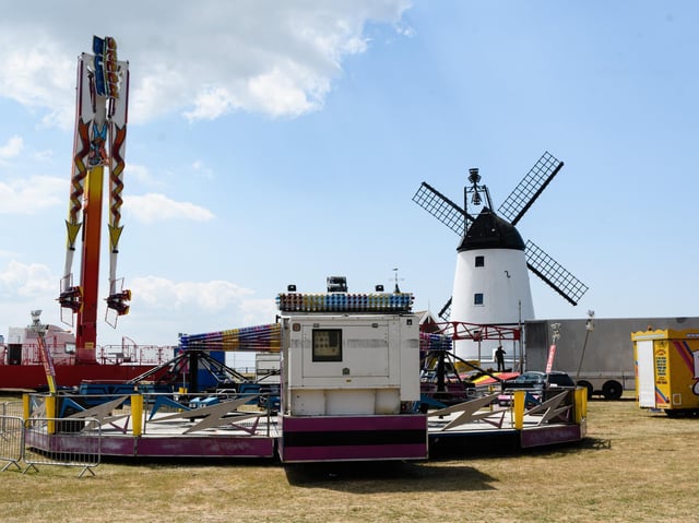 Cubbins funfair being set up in the shadow of the Windmill on Lytham Green
