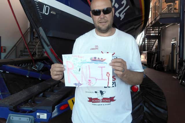 Lytham St Annes RNLI station coxswain Tom Stuart with the mystery letter